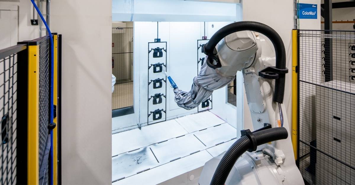 Robotische Pulverbeschichtungsanlage für die Bremsenproduktion