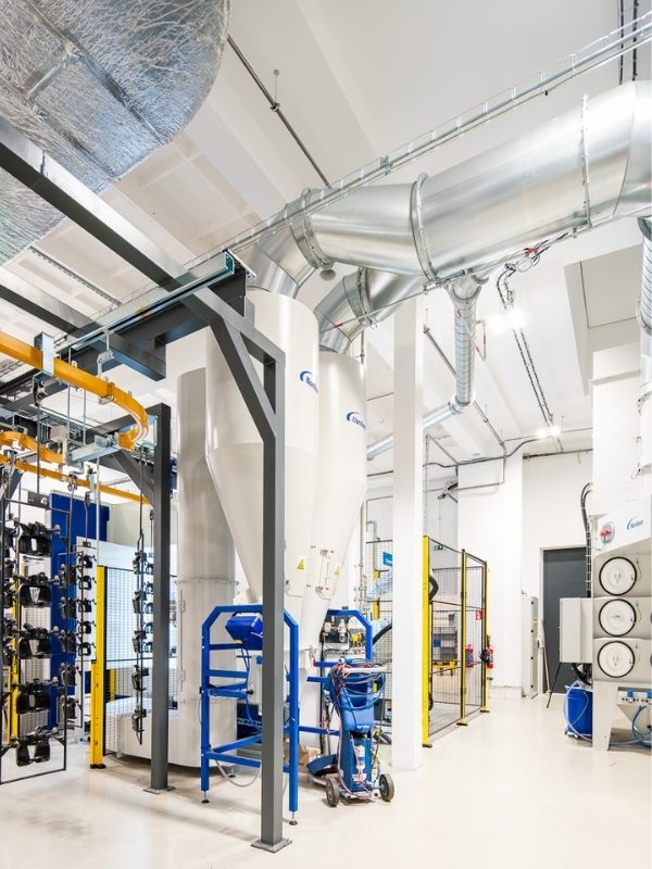 Robotische Pulverbeschichtungsanlage für die Bremsenproduktion